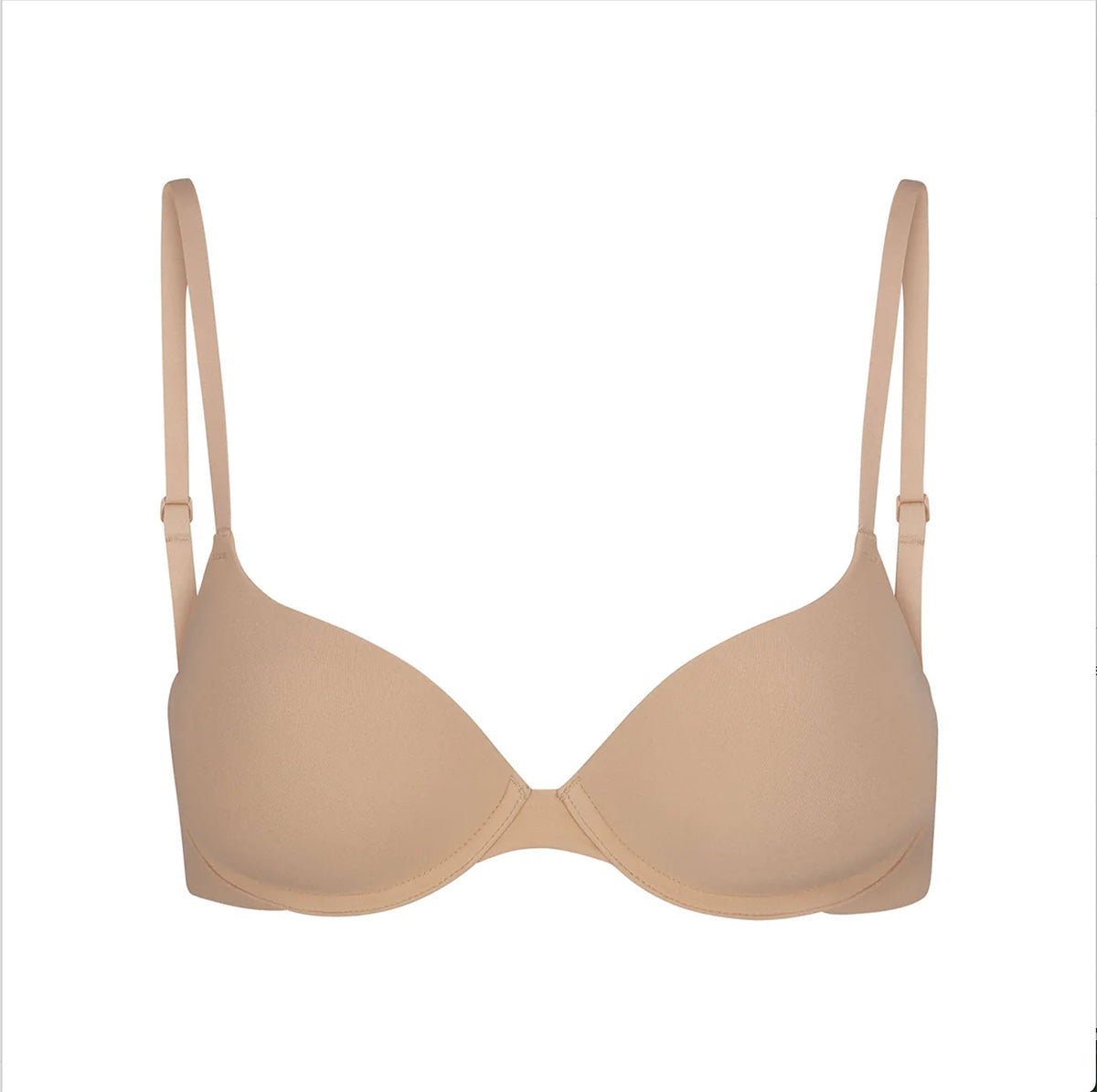 Beige bra on a white background
