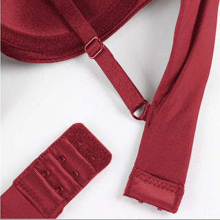 Red bra and underwear set on a white background