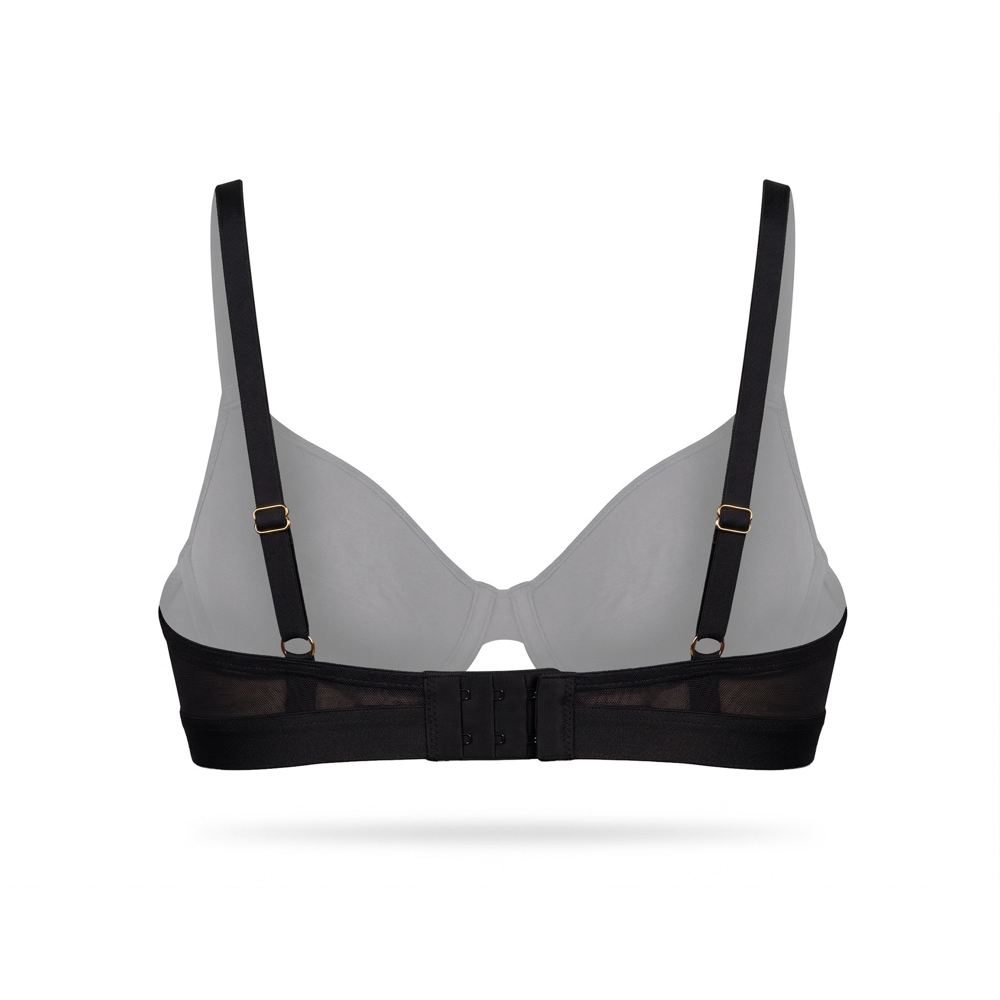 Black bra with mesh panels on a white background