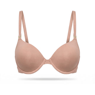 Beige bra on a white background