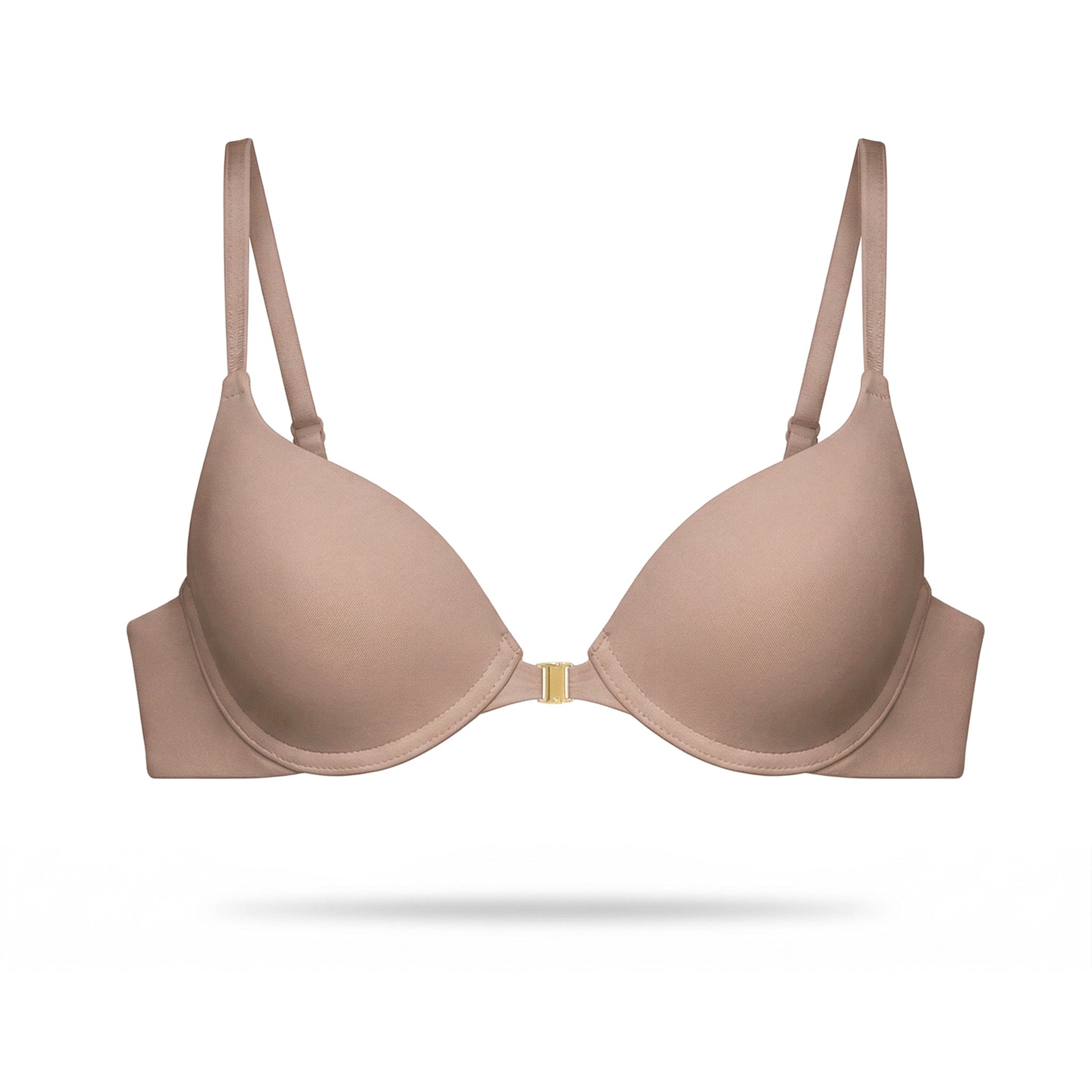 Beige bra on a white background