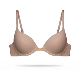 Beige bra on a white background