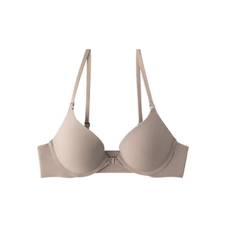 Beige bra on a white background