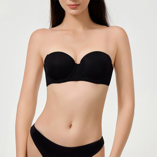 Black strapless bikini on a plain background
