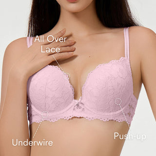 Pink lace bra with labeled features on a plain background