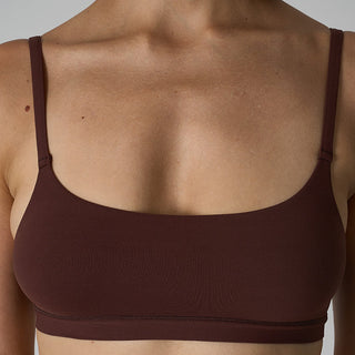 Brown sports bra on a neutral background