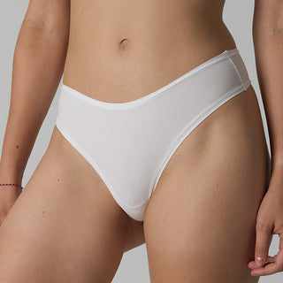 White underwear worn by a person on a plain background