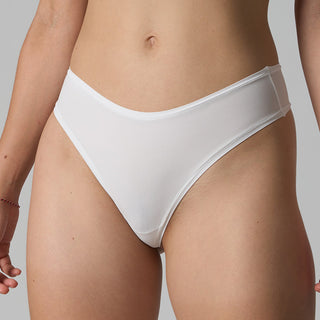 White underwear worn by a person on a gray background