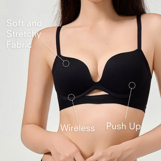 Black wireless push-up bra with text highlighting features on a plain background