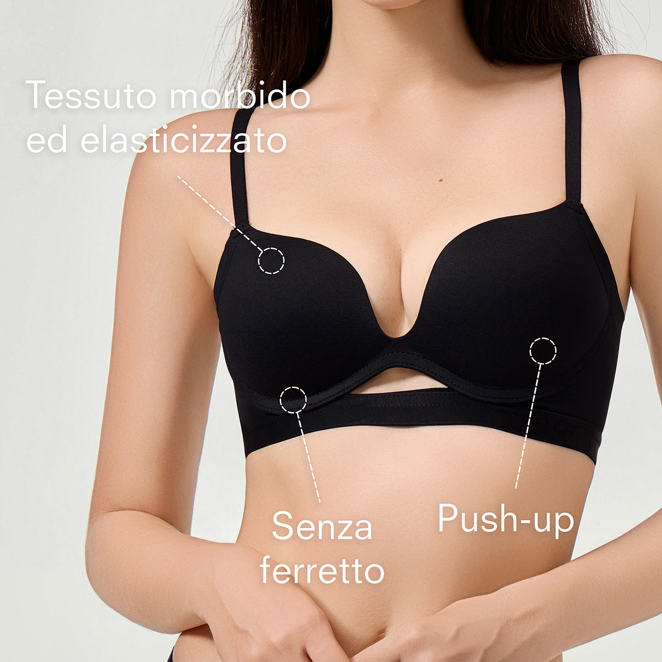Black bra with text highlighting features on a plain background
