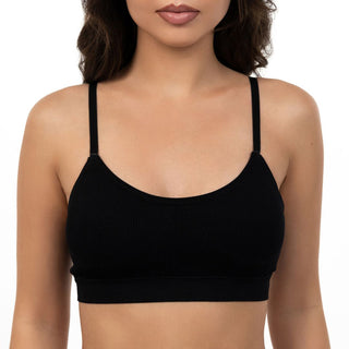 Black sports bra worn by a model on a white background