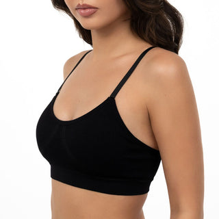 Black sports bra worn by a model on a white background