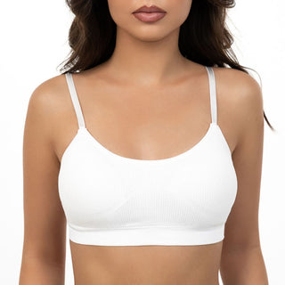 White ribbed crop top worn by a model on a white background