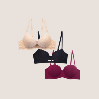 A collection of three push-up bras in beige, black, and red colors, each designed for a different occasion as part of the 'Weekend Confidence 3-Pack'.